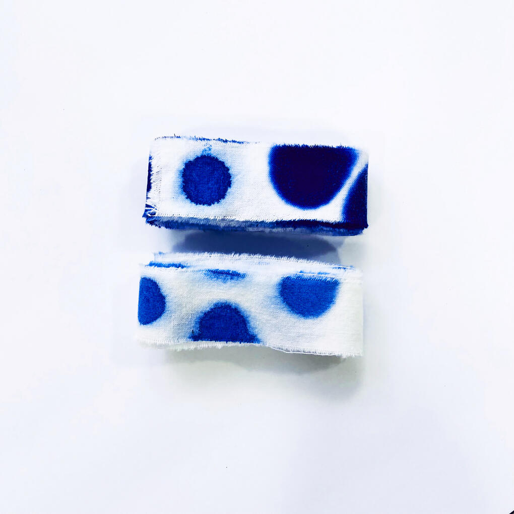 Hand dyed polka-dot ribbons on old sheeting
